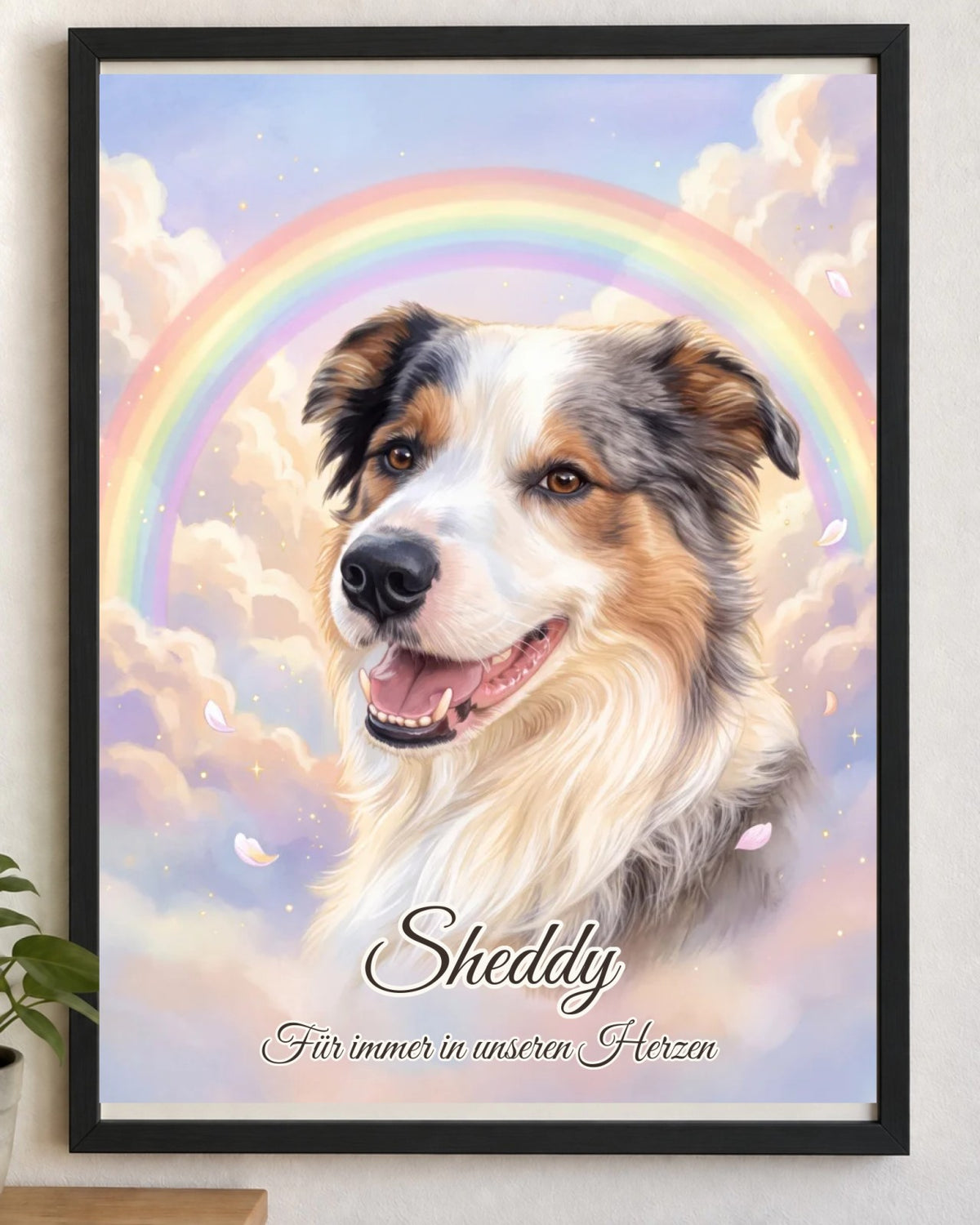 Gedenkportrait Regenbogenbrücke im schwarzen Holzrahmen, Hochformat: Hund Sheddy vor einem Regenbogen in pastellfarbenen Wolken, mit Namen