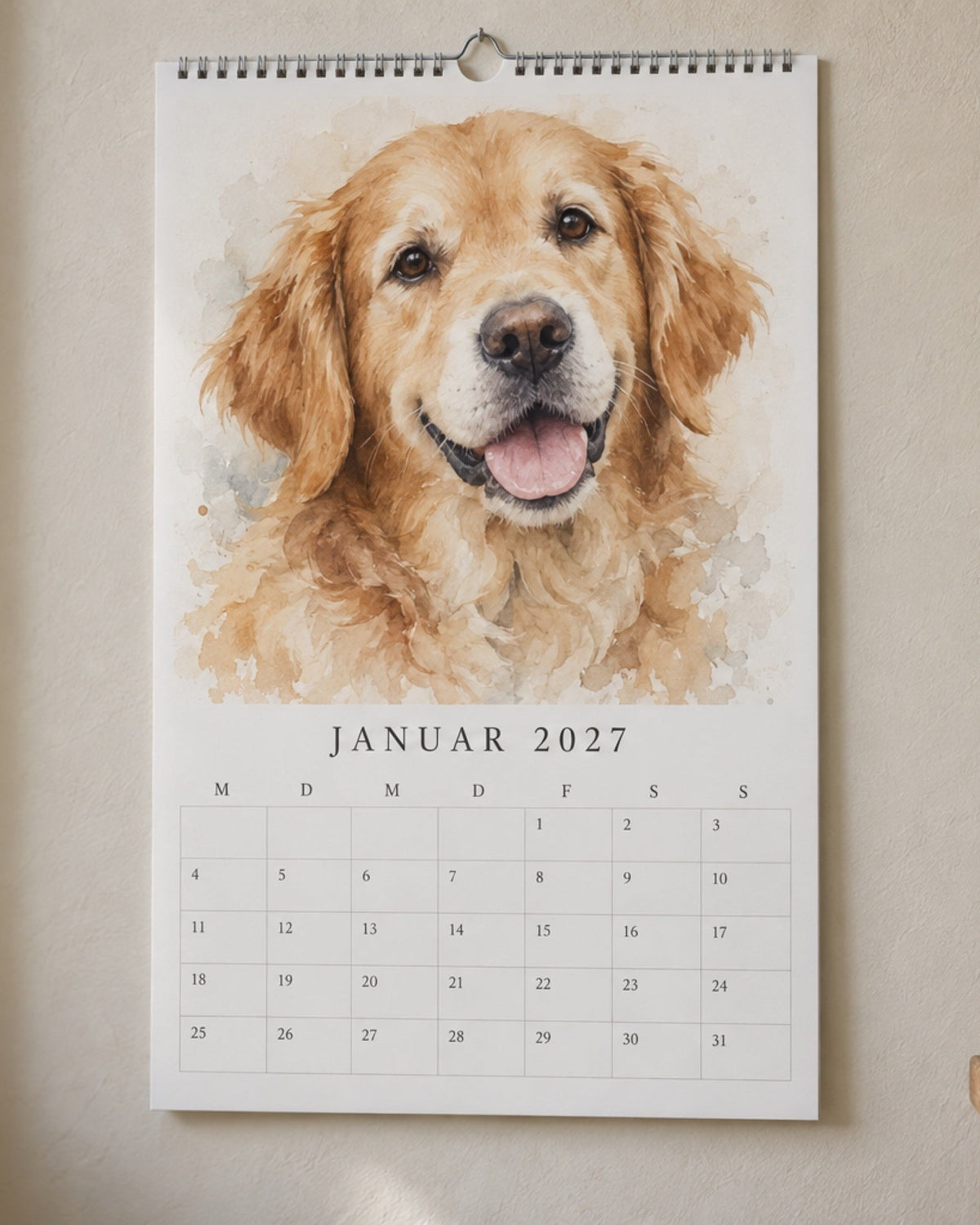 Haustier-Wandkalender 2027 mit Hundeportrait an der Wand